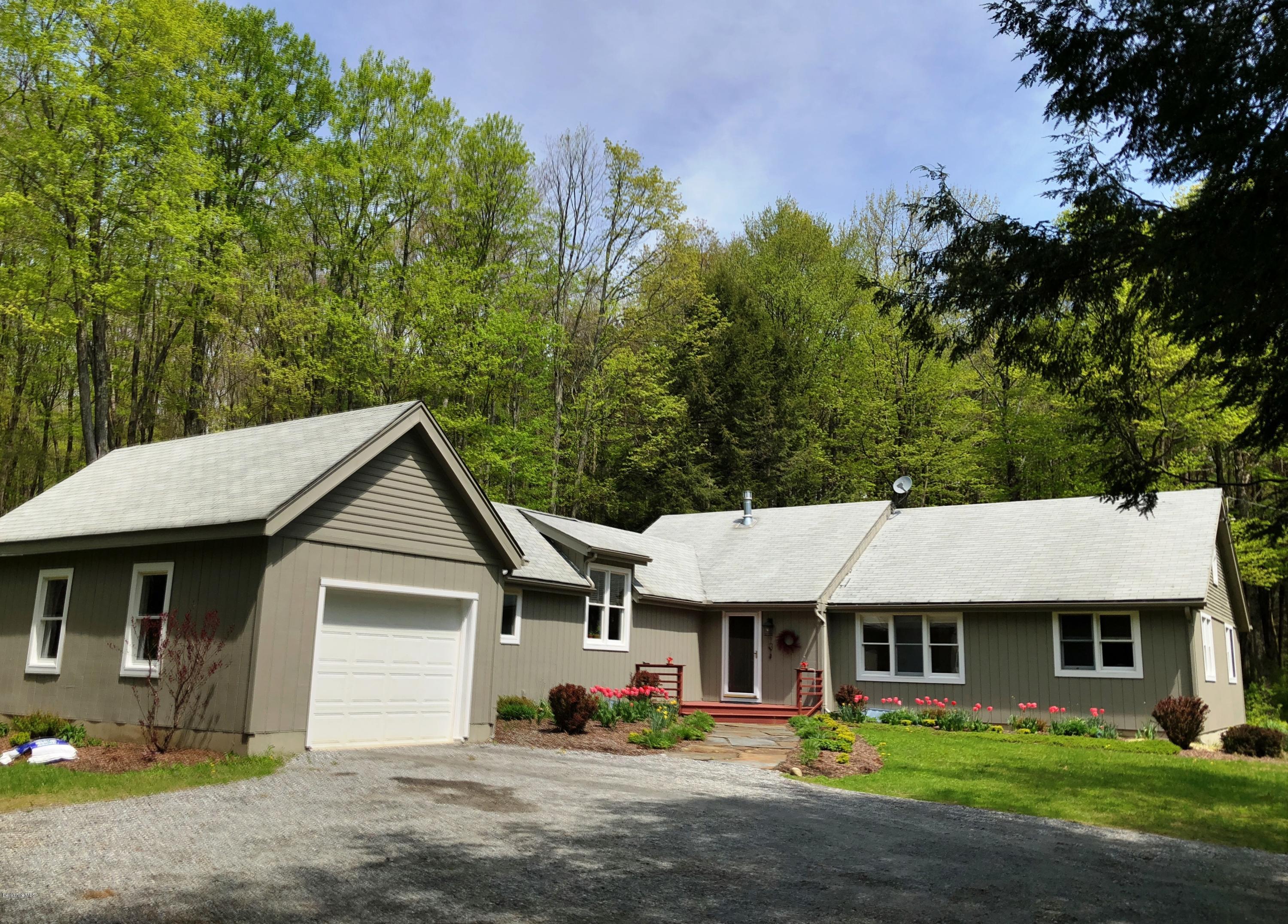 131 Tyringham Road Otis, MA 01253 - Photo 44 of 46 a front view of a house with garden