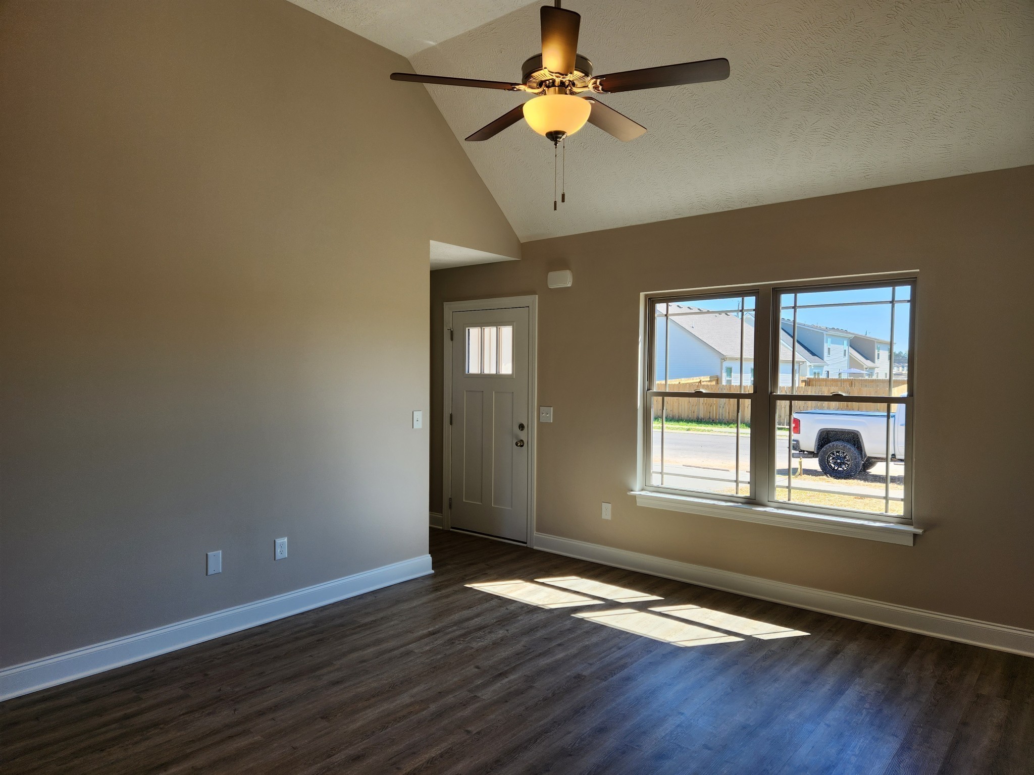 2843 Upstream Road Christiana, TN 37037 - Photo 5 of 64 a view of an empty room with a window and wooden floor