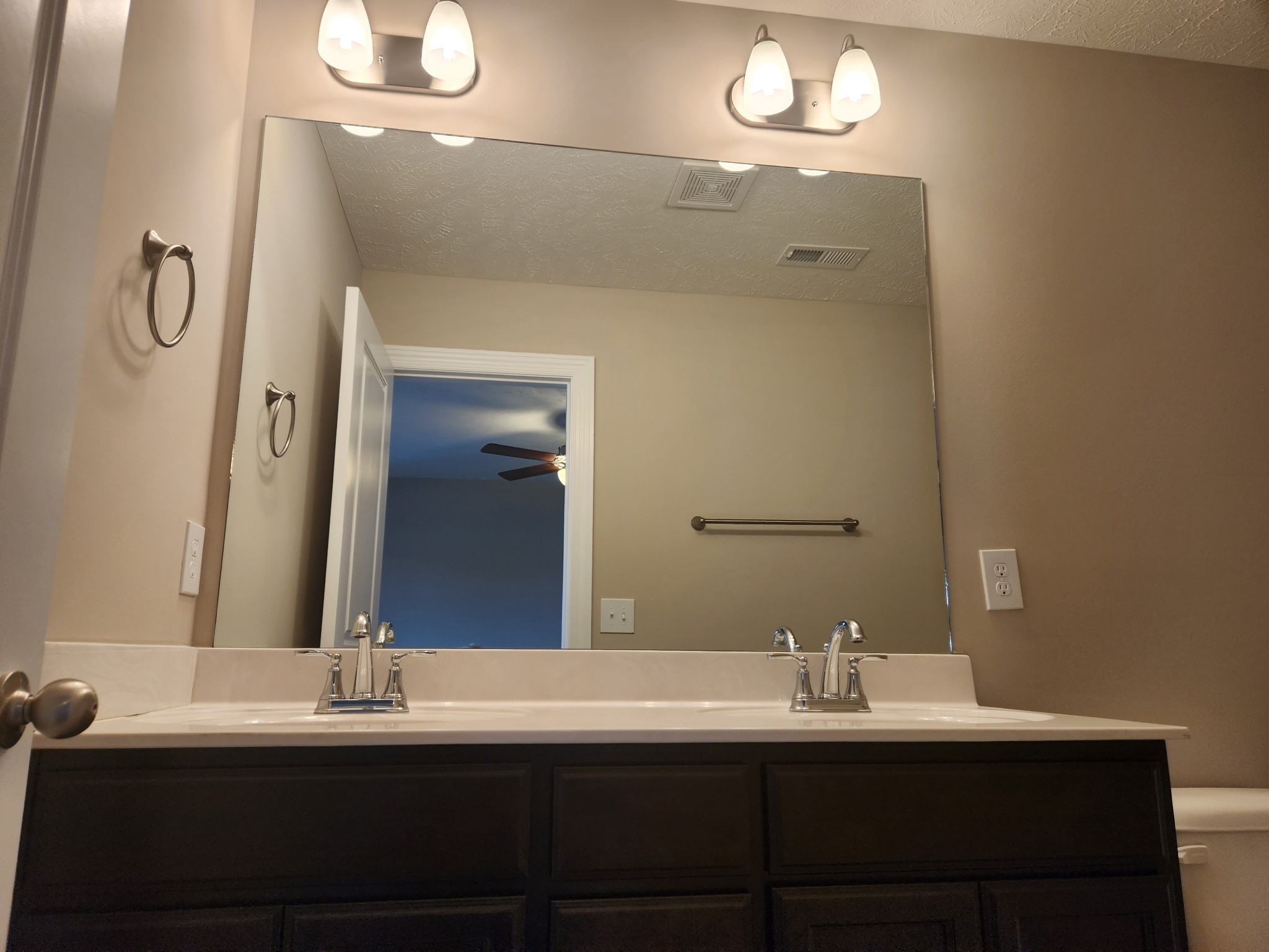 2843 Upstream Road Christiana, TN 37037 - Photo 57 of 64 a bathroom with double vanity sinks and a mirror