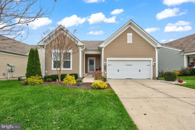 a front view of house with yard