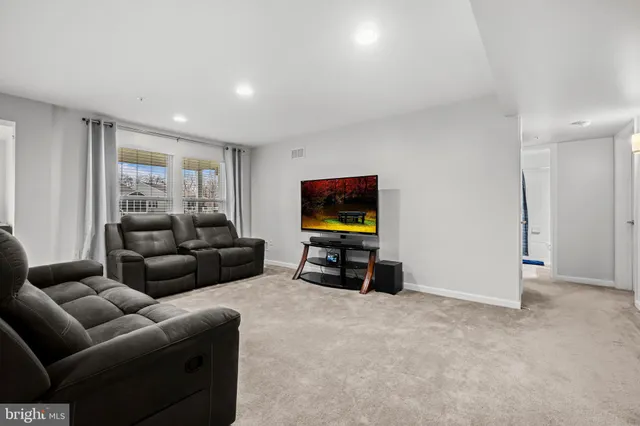 a bedroom with a bed and a cabinets