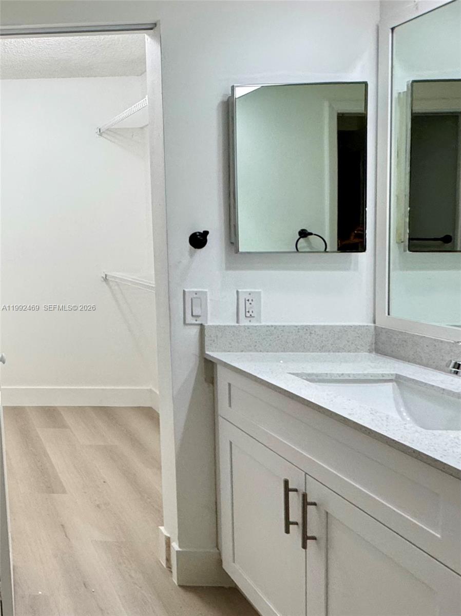 2159 Baton Rouge, Unit 2159 Weston, FL 33326 - Photo 26 of 49 a bathroom with a sink and a mirror