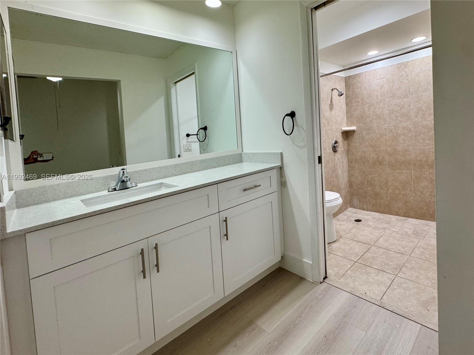 2159 Baton Rouge, Unit 2159 Weston, FL 33326 - Photo 27 of 49 a spacious bathroom with a double vanity sink mirror and shower