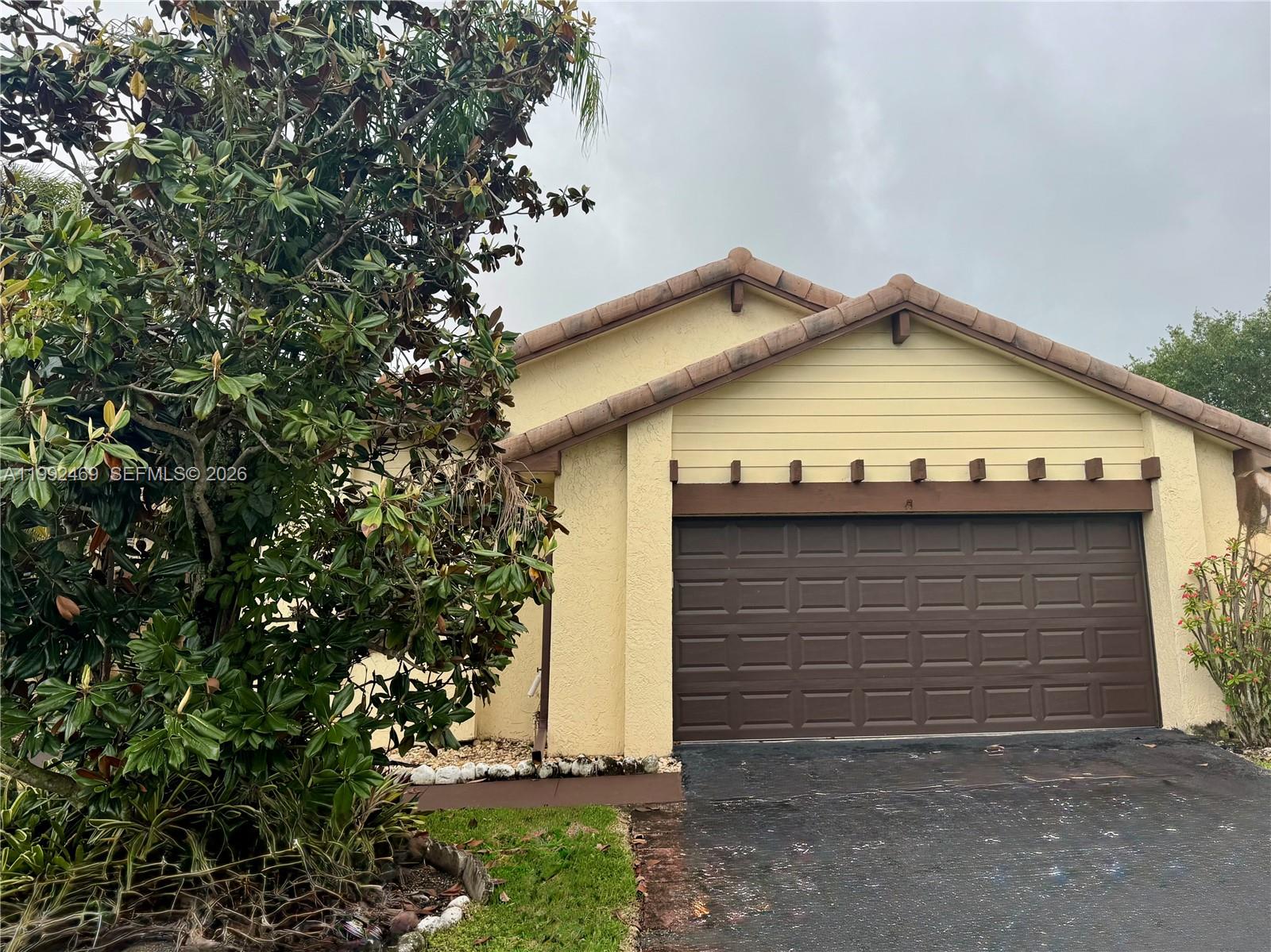 2159 Baton Rouge, Unit 2159 Weston, FL 33326 - Photo 3 of 49 a view of a garage of the house