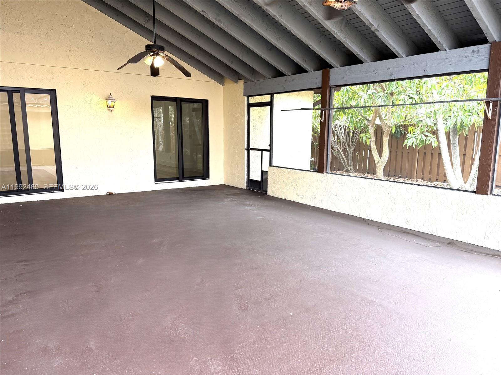 2159 Baton Rouge, Unit 2159 Weston, FL 33326 - Photo 41 of 49 a view of an empty room with a large window