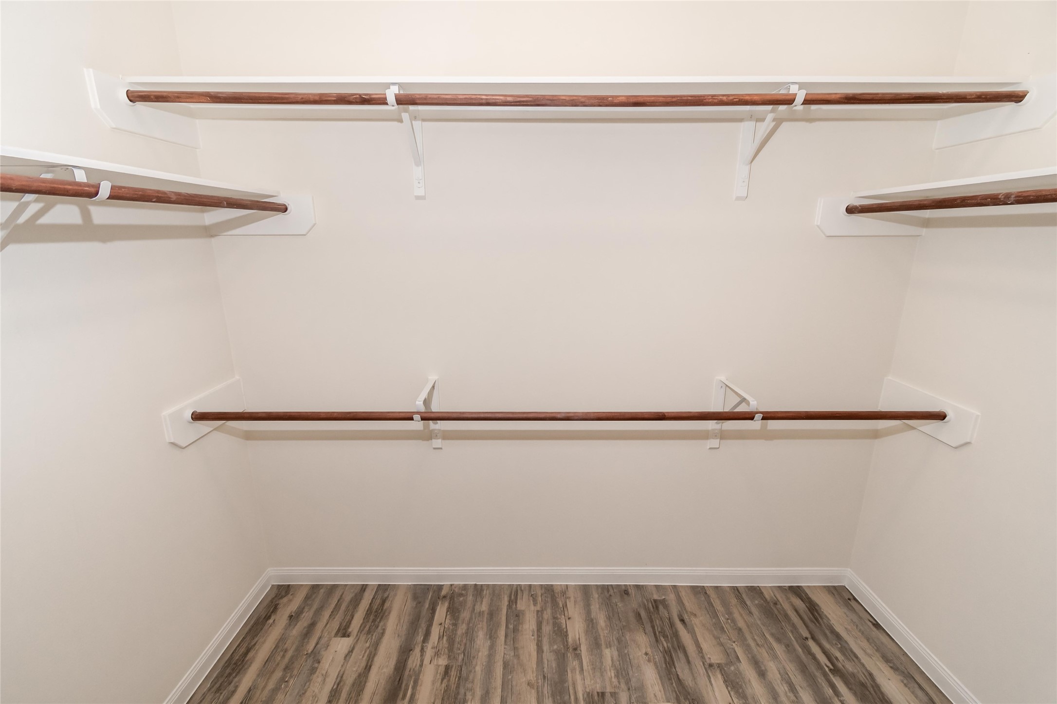 58 Santa Barbara Drive Manvel, TX 77578 - Photo 12 of 12 a view of a room with racks on the wall