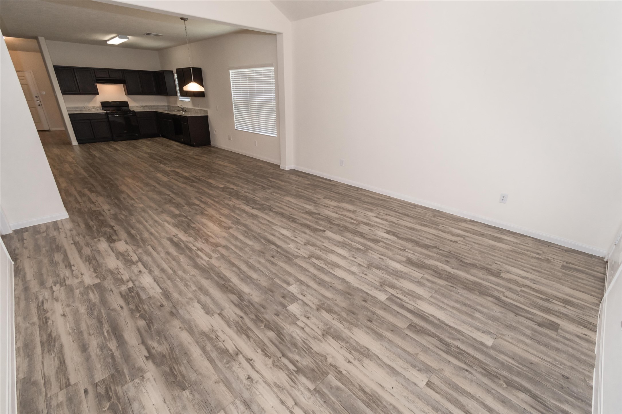 58 Santa Barbara Drive Manvel, TX 77578 - Photo 9 of 12 a view of kitchen and utility room