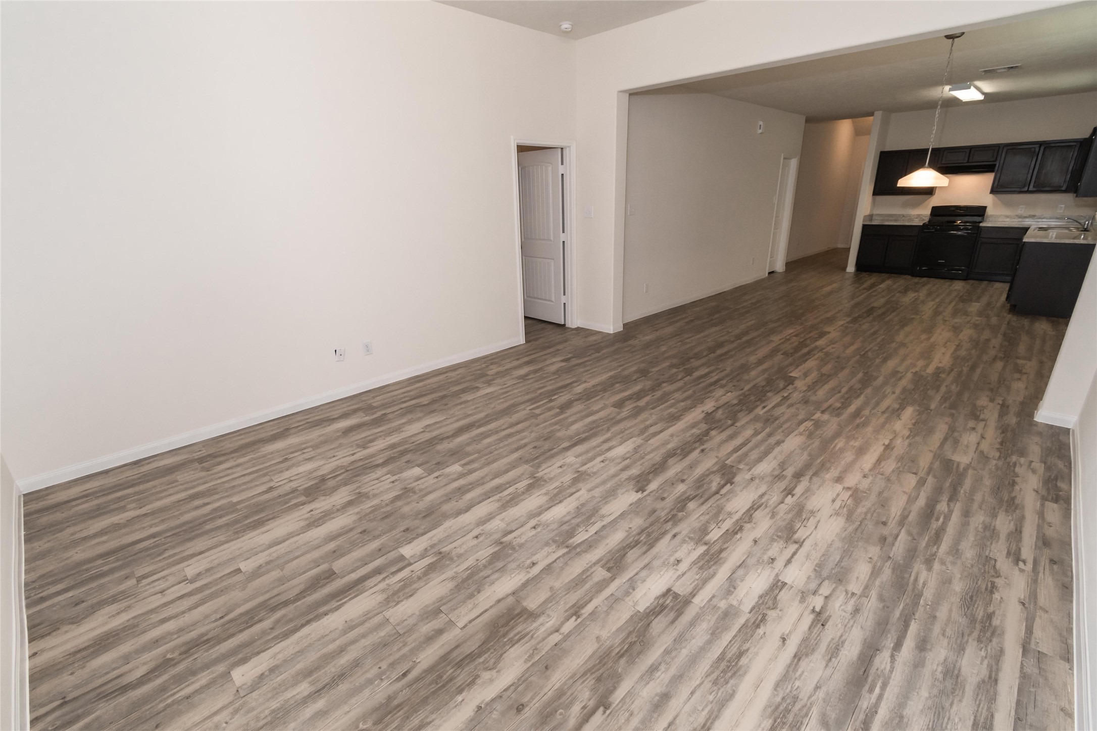 58 Santa Barbara Drive Manvel, TX 77578 - Photo 10 of 12 a view of a room with wooden floor