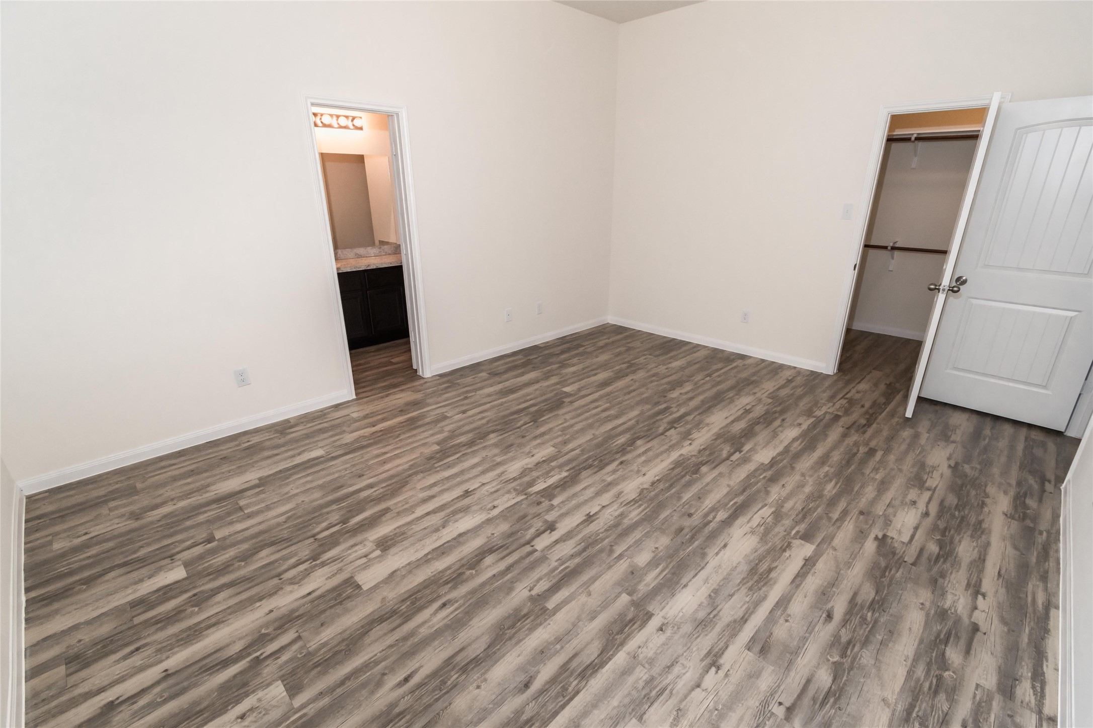 58 Santa Barbara Drive Manvel, TX 77578 - Photo 11 of 12 an empty room with wooden floor and sink