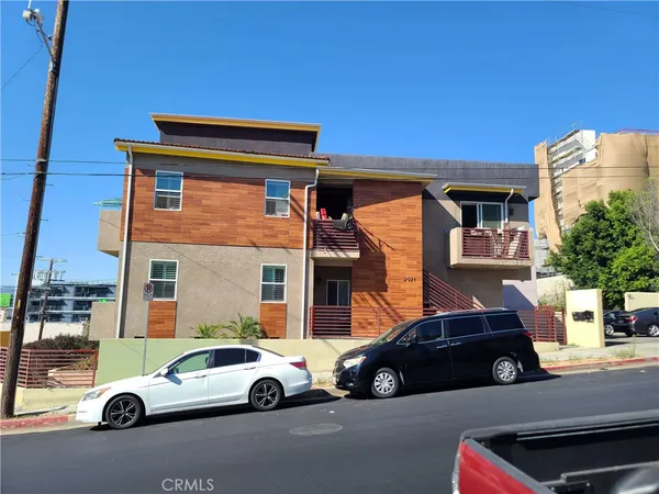 a car parked in front of a house