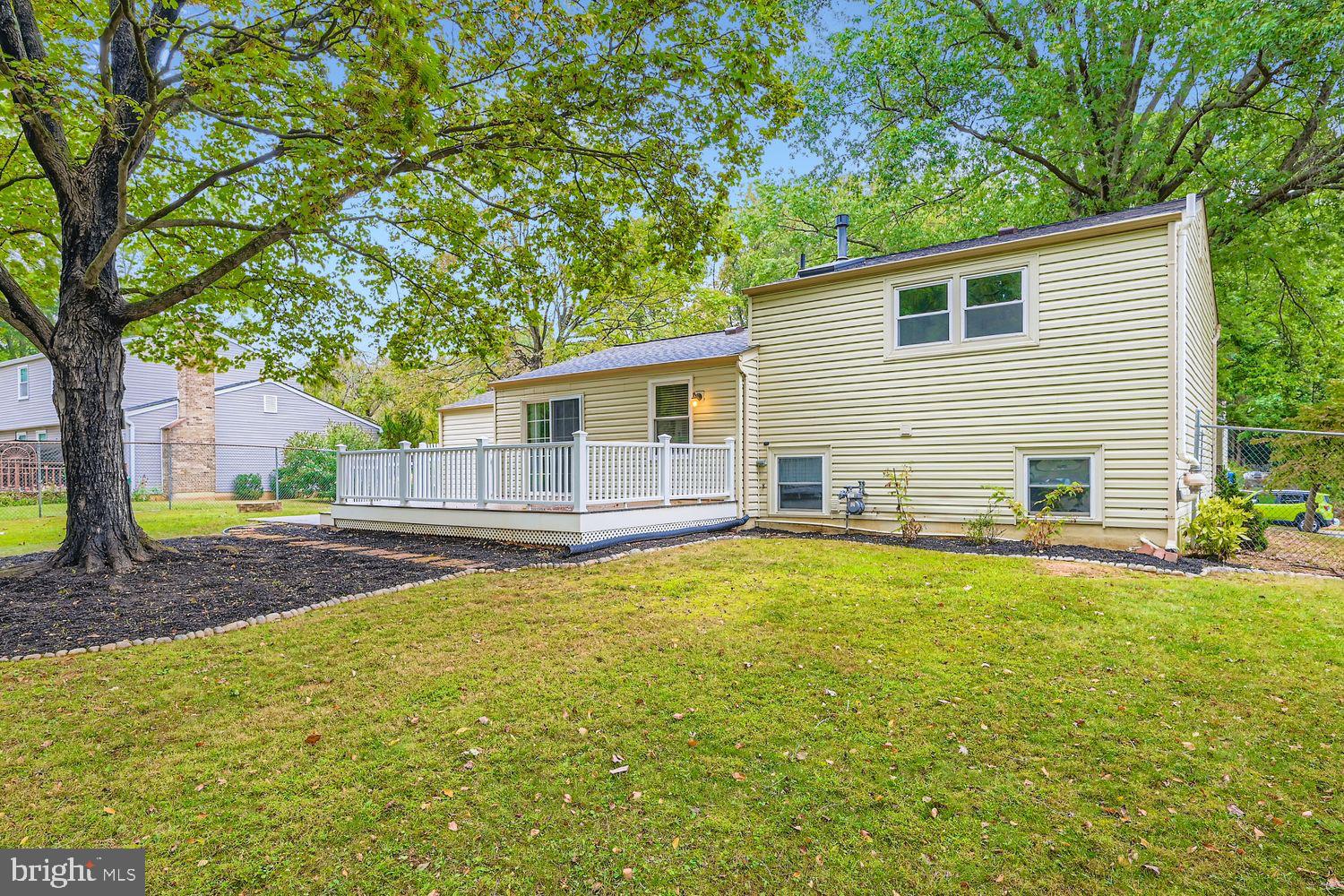 15604 Wembrough Street Silver Spring, MD 20905 - Photo 31 of 33 Charming home with spacious outdoor deck.