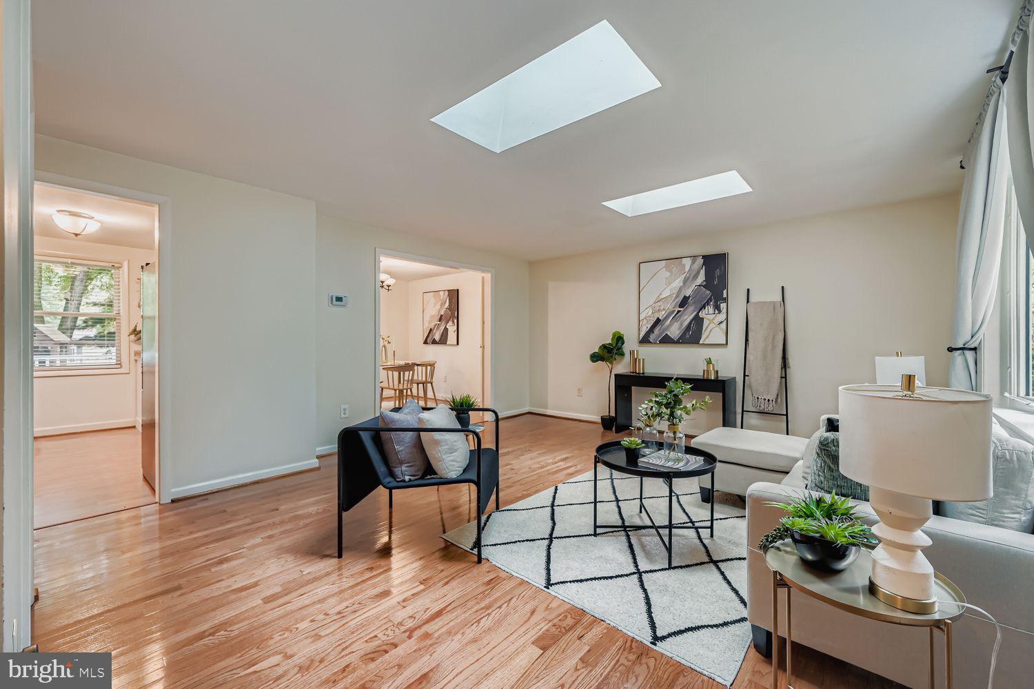 15604 Wembrough Street Silver Spring, MD 20905 - Photo 4 of 33 Bright and airy living space with skylights.