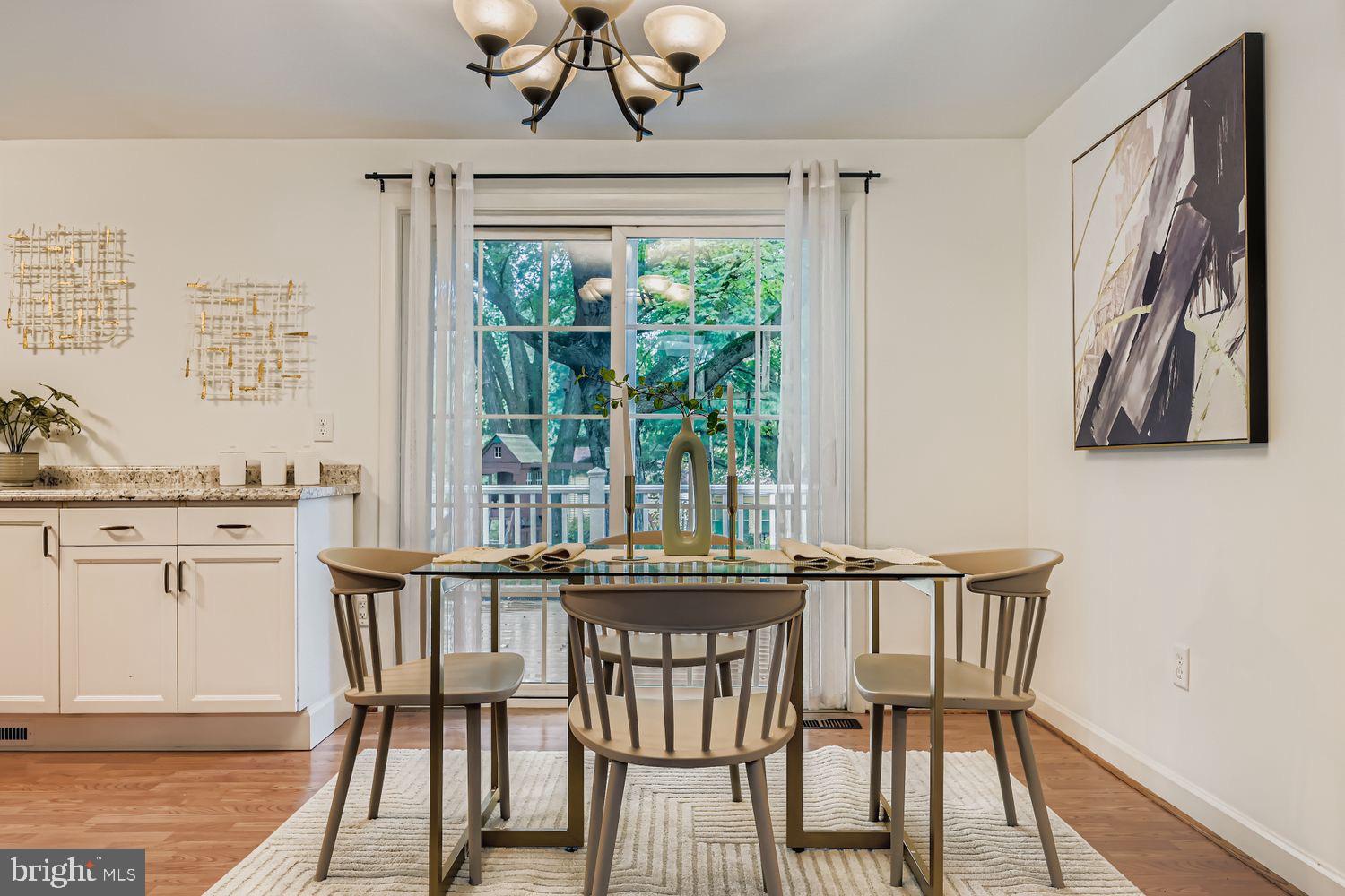 15604 Wembrough Street Silver Spring, MD 20905 - Photo 9 of 33 Bright dining area with garden views.