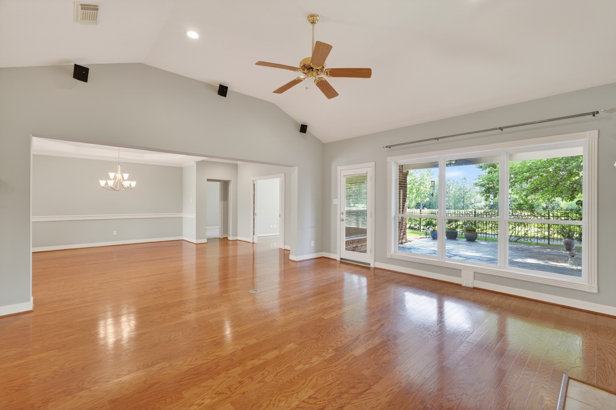 20714 Flora View Court Spring, TX 77379 - Photo 16 of 40 a view of empty room with wooden floor and fan