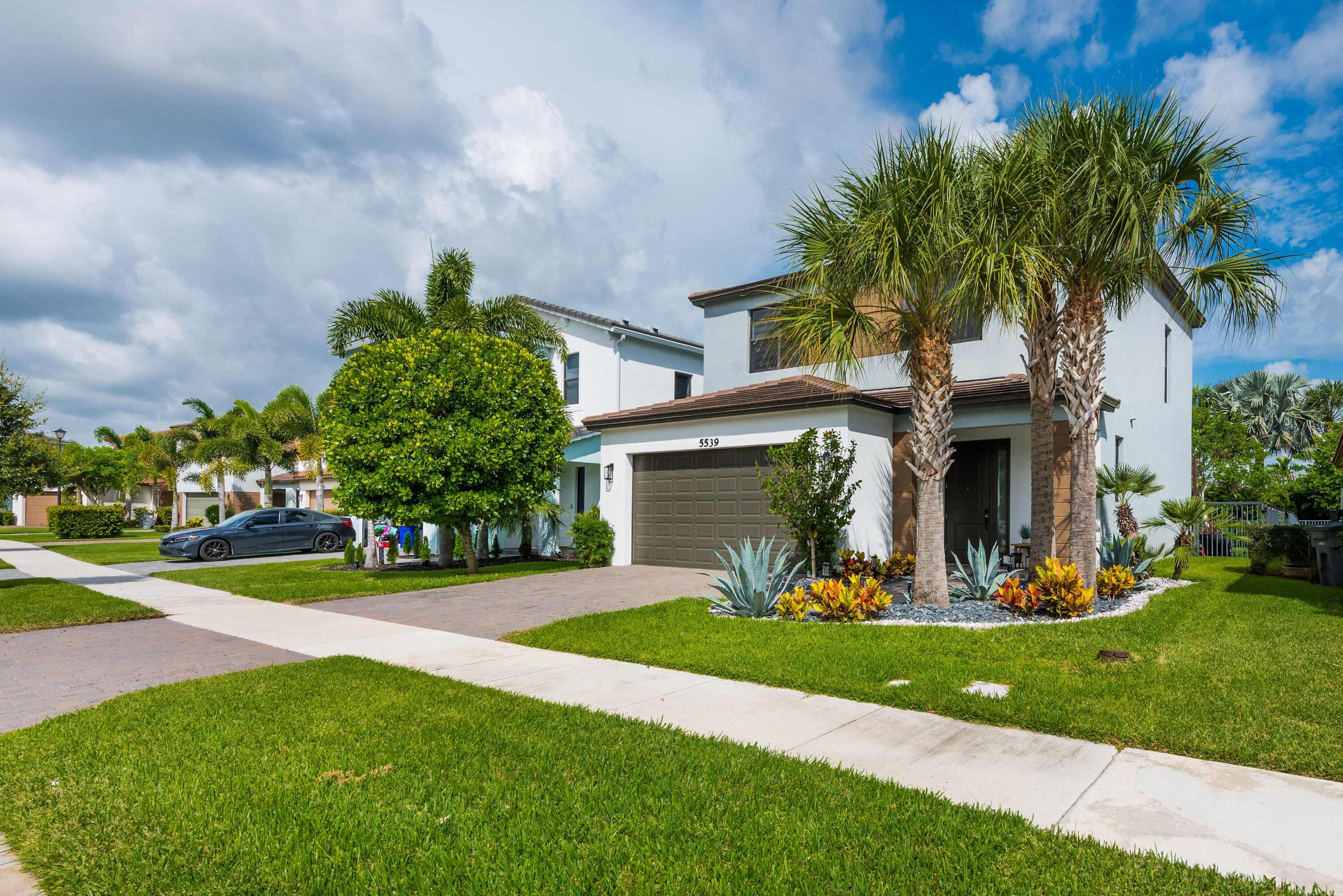 5539 Starfish Road Westlake, FL 33470 - Photo 4 of 42 Side View Of Home