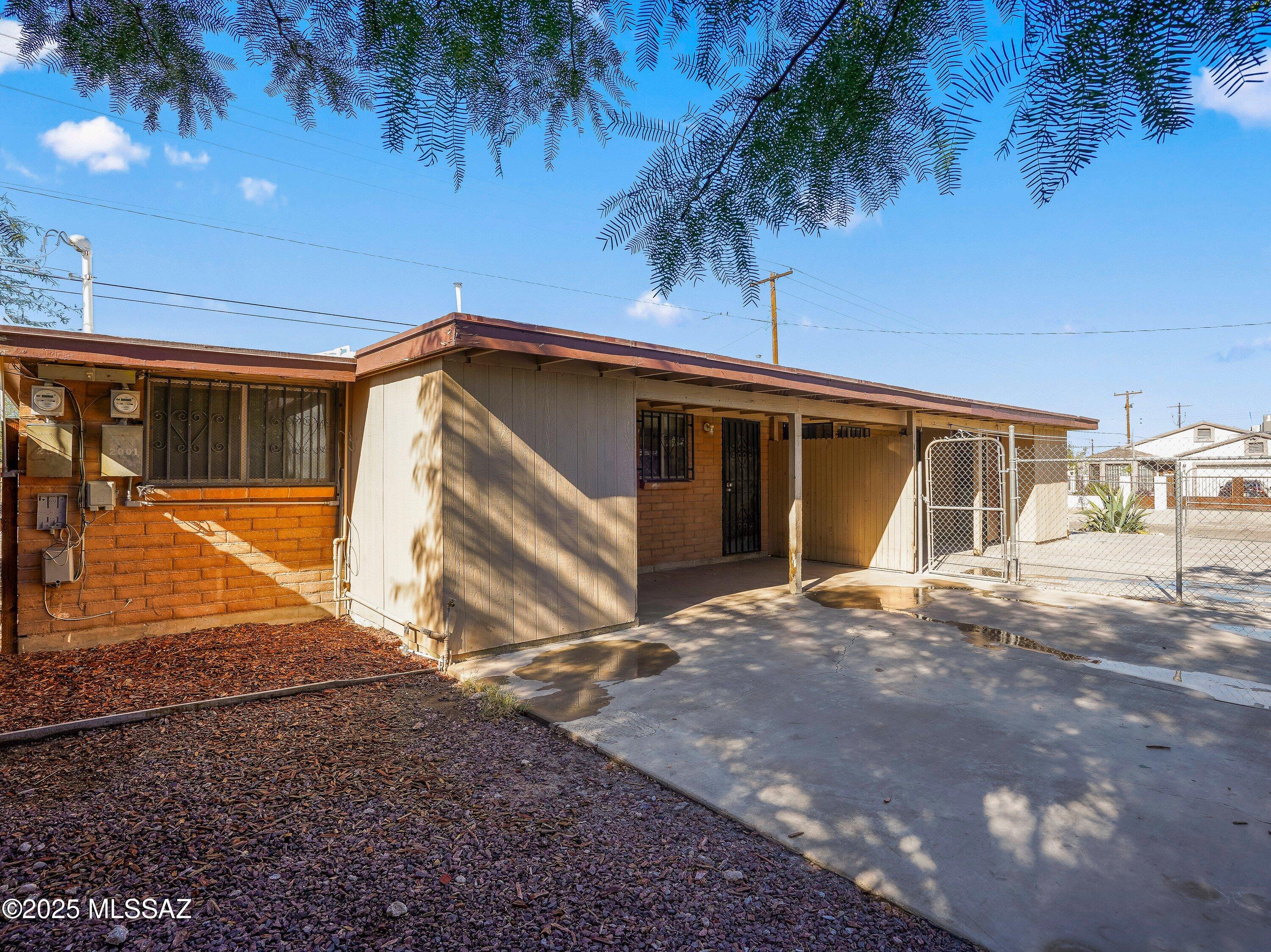 2001 South 3rd Avenue Tucson, AZ 85713 - Photo 23 of 42 a view of house with backyard and outdoor space