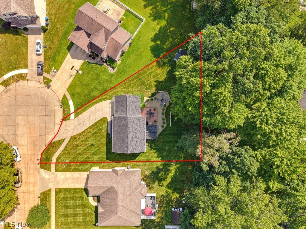 851 Susan Road Ravenna, OH 44266 - Photo 48 of 50 Expansive lot featuring mature trees, a cul-de-sac street, and a substantial driveway