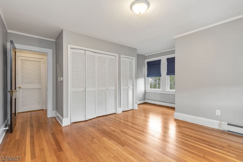 153 Stirling Road Watchung, NJ 07069 - Photo 11 of 31 a view of empty room with wooden floor