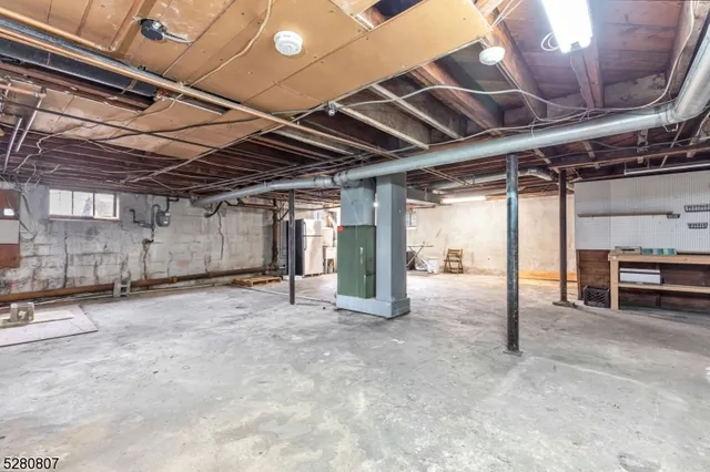 a view of empty room with wooden ceiling