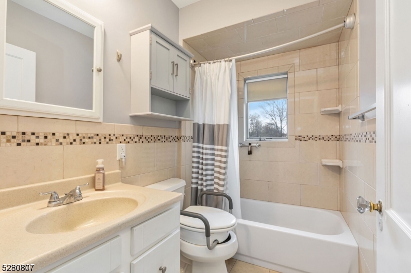 153 Stirling Road Watchung, NJ 07069 - Photo 17 of 31 a bathroom with a sink toilet and shower