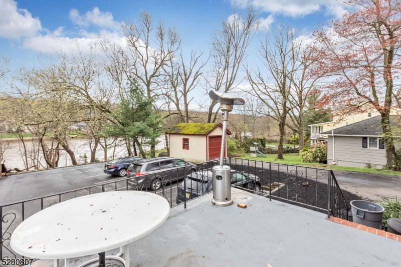 153 Stirling Road Watchung, NJ 07069 - Photo 6 of 31 a view of a dinning table and chairs in the patio