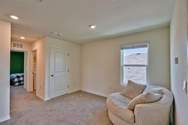 a bathroom with a double vanity sink and mirror