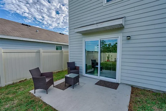 an aerial view of a house with a garden