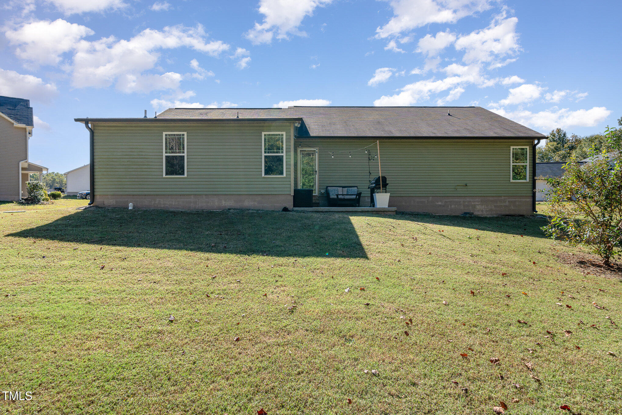 170 Willow Ridge Circle Willow Spring, NC 27592 - Photo 19 of 21 a view of a house with a patio