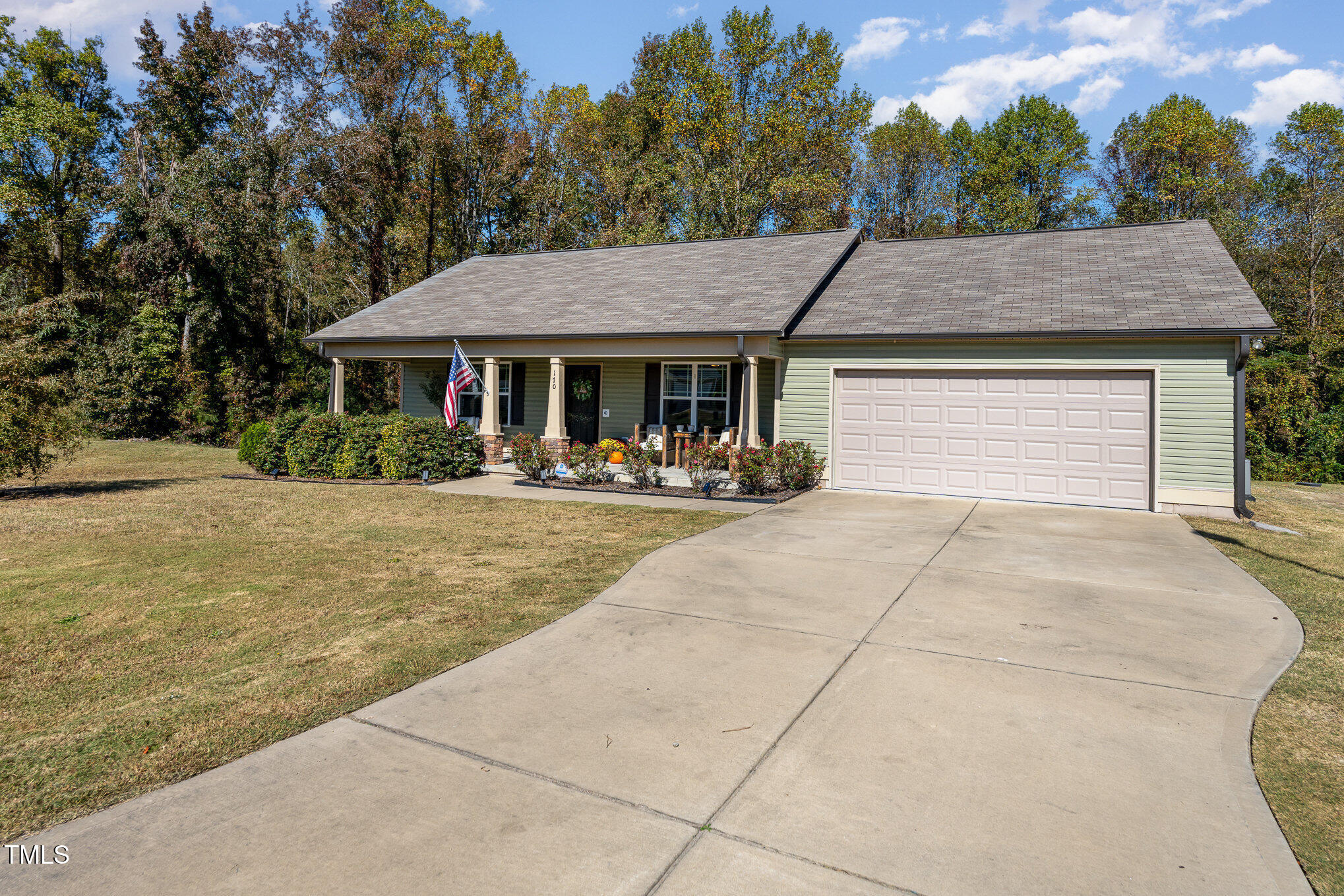 170 Willow Ridge Circle Willow Spring, NC 27592 - Photo 3 of 21 a front view of a house with yard