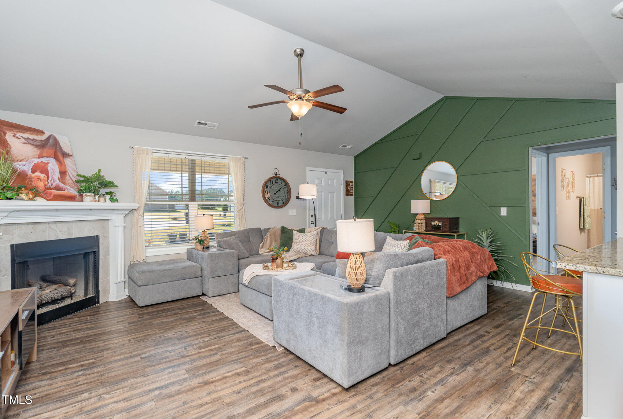 170 Willow Ridge Circle Willow Spring, NC 27592 - Photo 4 of 21 a living room with furniture and a fireplace