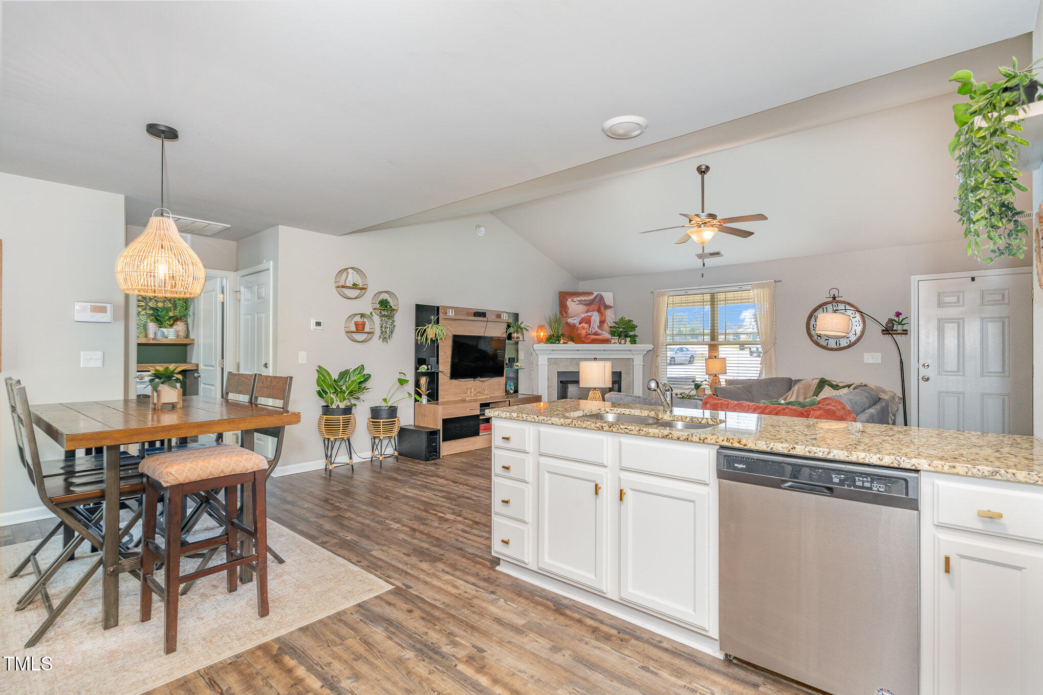 170 Willow Ridge Circle Willow Spring, NC 27592 - Photo 7 of 21 a view of a kitchen and dining room