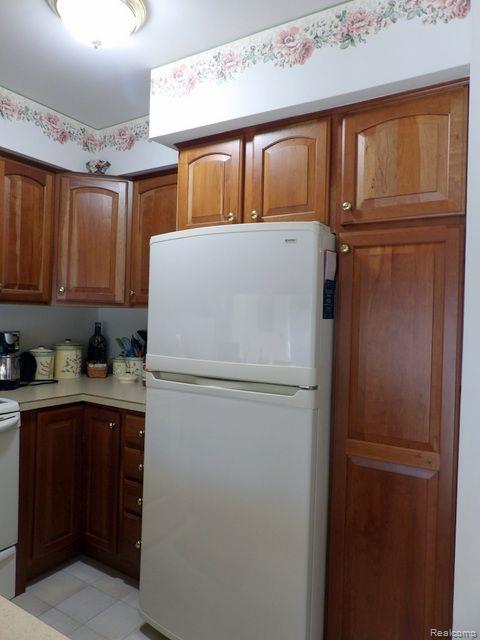 17485 Rudgate Street, Unit 33 Southgate, MI 48195 - Photo 14 of 29 19. PANTRY + REFRIGERATOR STAYS!