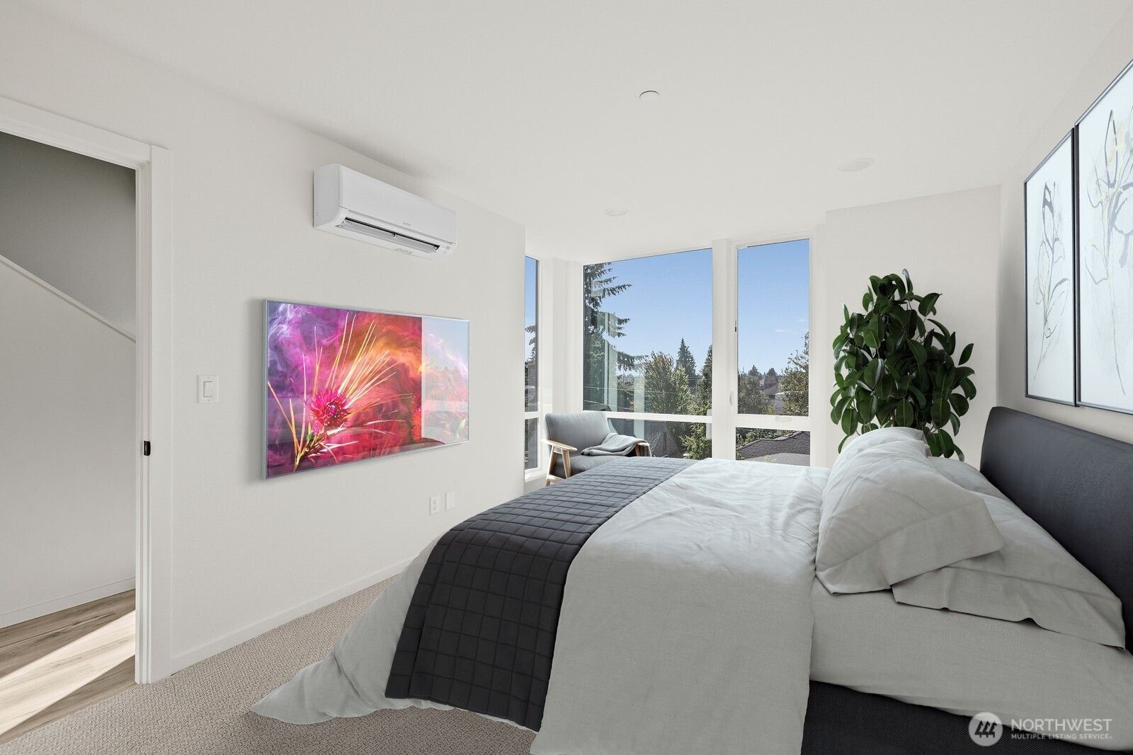 8322 16th Avenue Northwest, Unit D Seattle, WA 98117 - Photo 13 of 24 a bedroom with a bed and a painting on the wall
