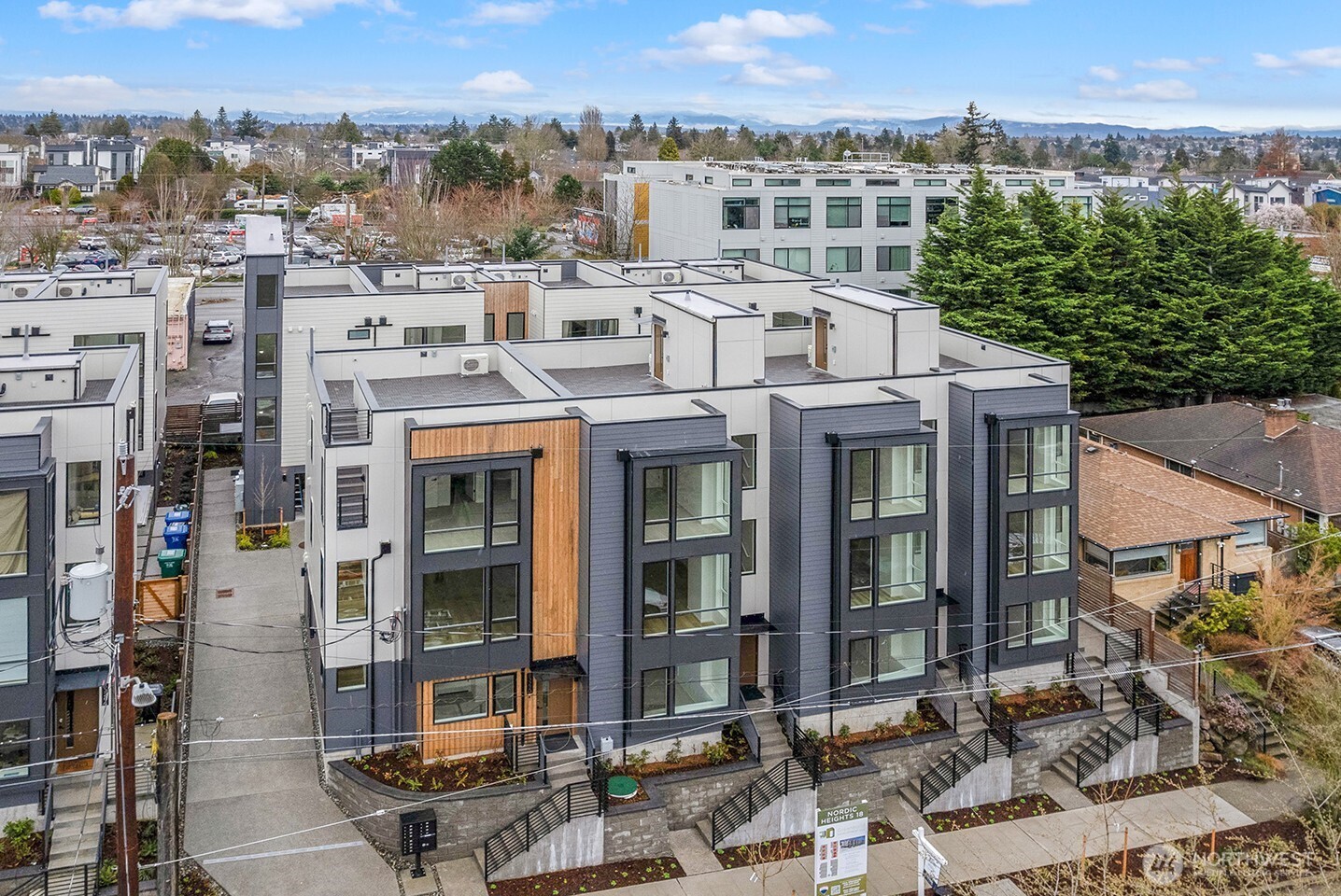 8322 16th Avenue Northwest, Unit D Seattle, WA 98117 - Photo 2 of 24 a view of a city that has tall buildings