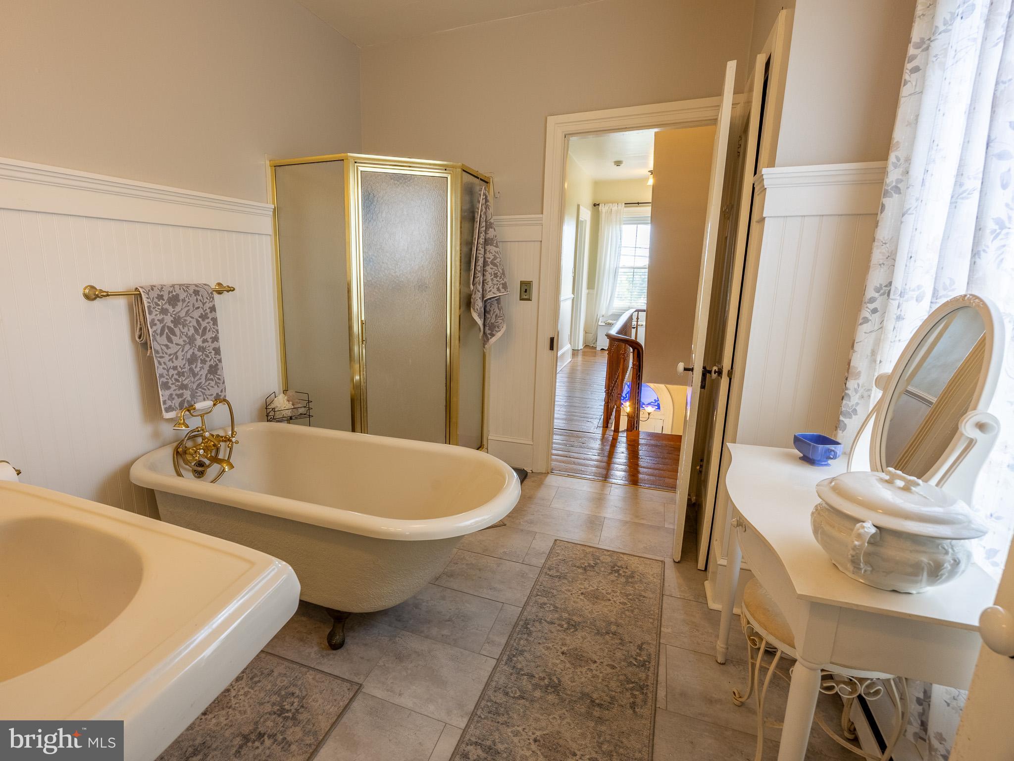 225 Niantic Road Barto, PA 19504 - Photo 50 of 82 a bathroom with a tub sink and mirror
