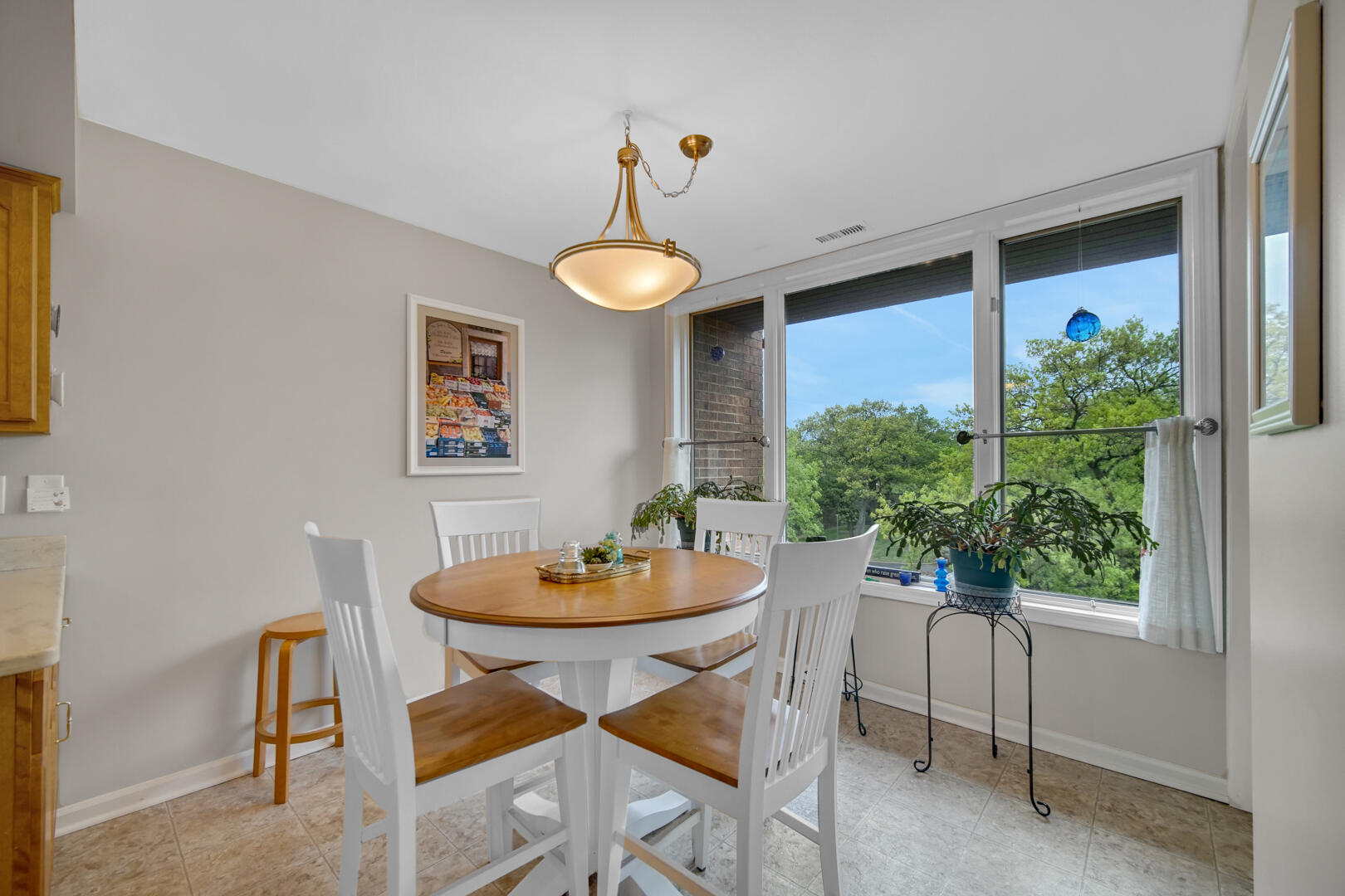 910 Ridge Road, Unit 405 Munster, IN 46321 - Photo 12 of 37 a dining room with furniture and a window