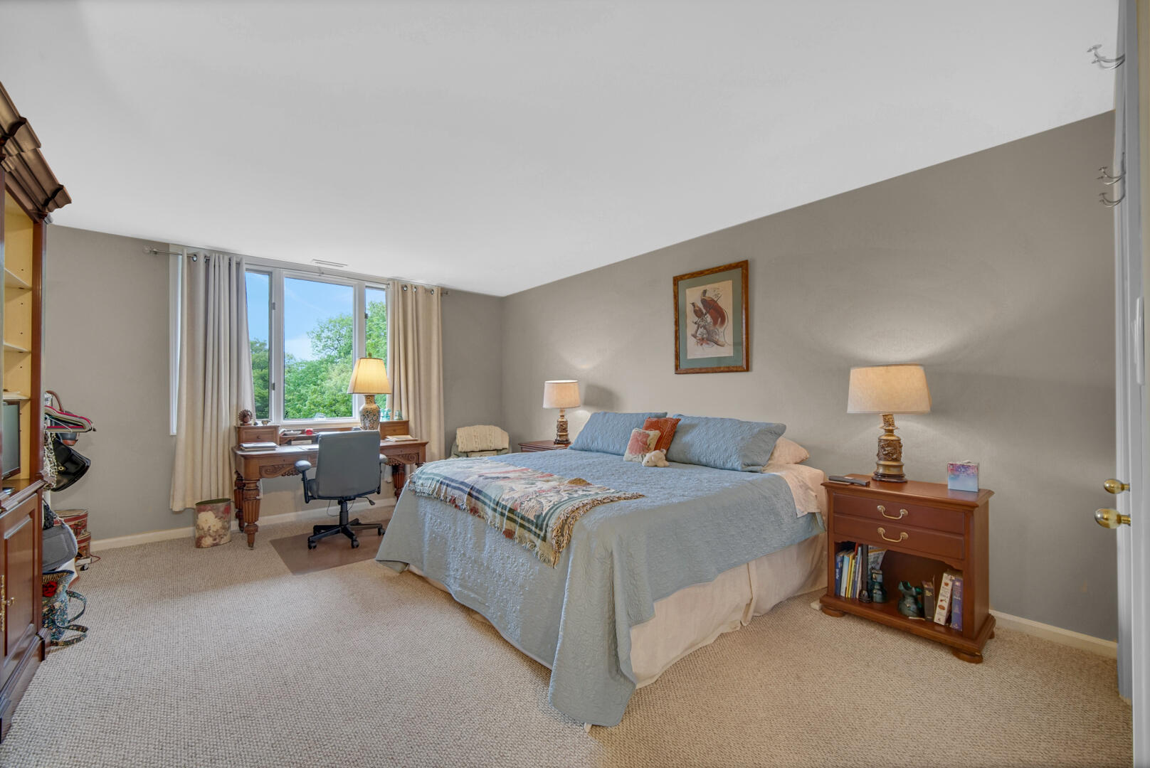 910 Ridge Road, Unit 405 Munster, IN 46321 - Photo 15 of 37 a bedroom with a bed couch and a window