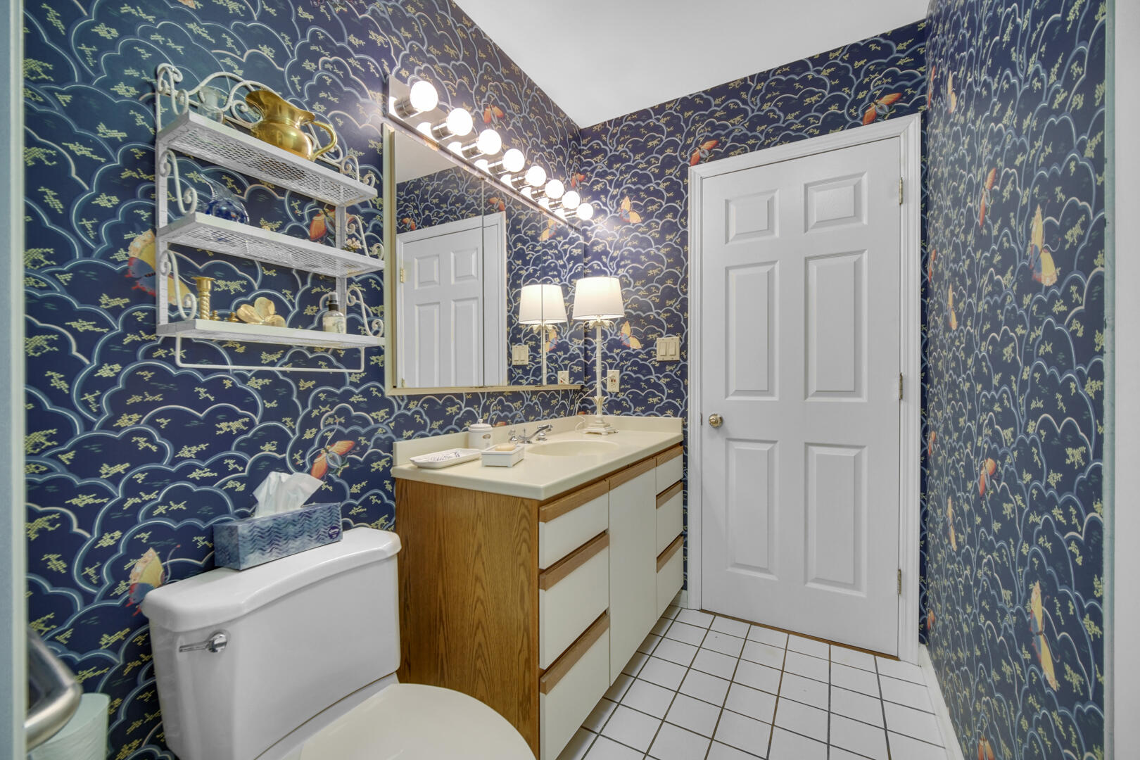 910 Ridge Road, Unit 405 Munster, IN 46321 - Photo 22 of 37 a bathroom with a sink a toilet and mirror