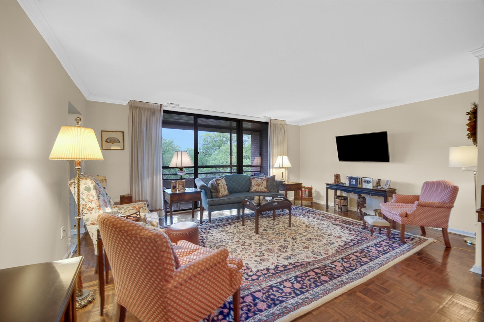 910 Ridge Road, Unit 405 Munster, IN 46321 - Photo 3 of 37 a living room with furniture and a flat screen tv