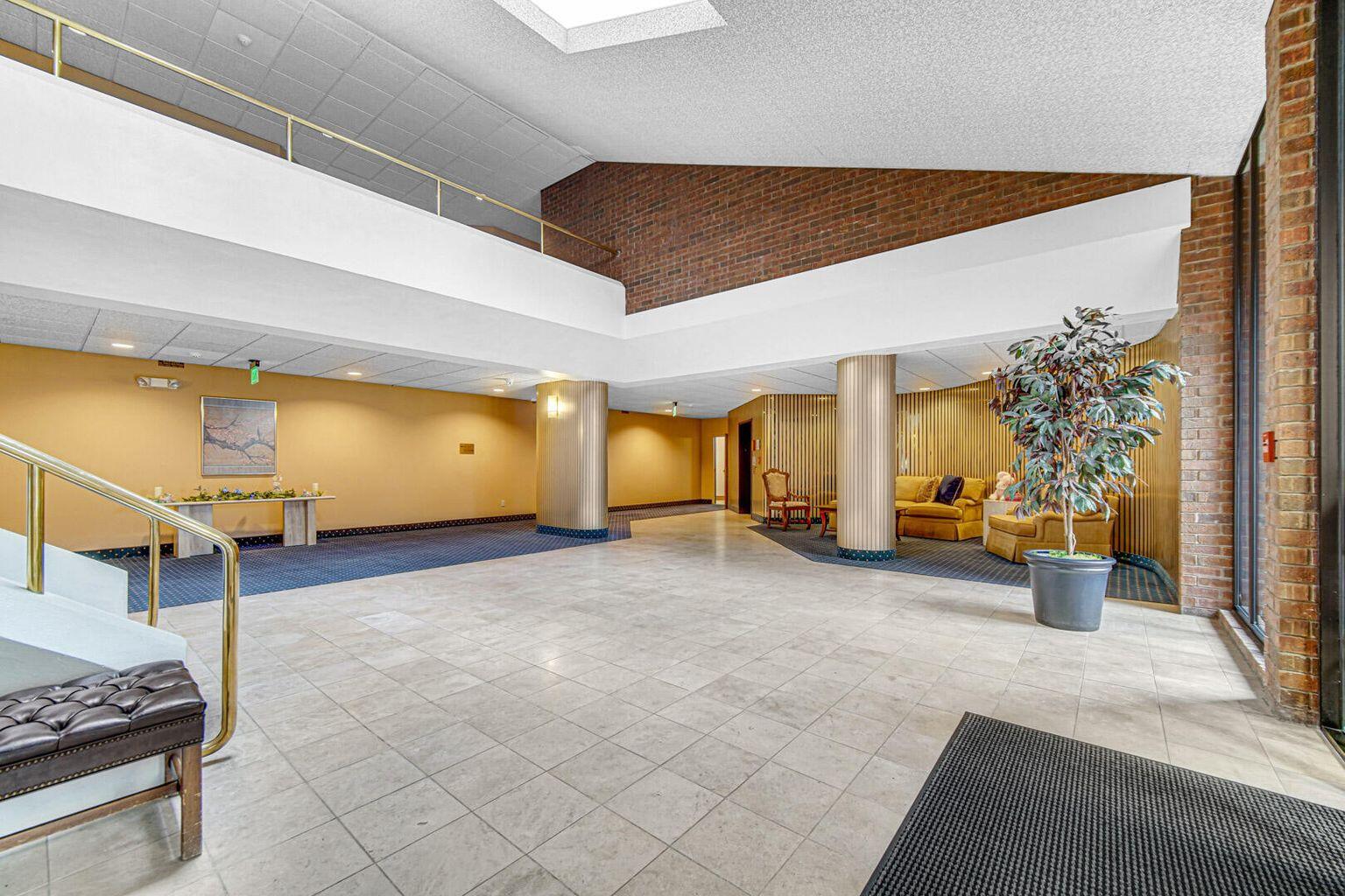 910 Ridge Road, Unit 405 Munster, IN 46321 - Photo 32 of 37 a view of a room with gym equipment and a table