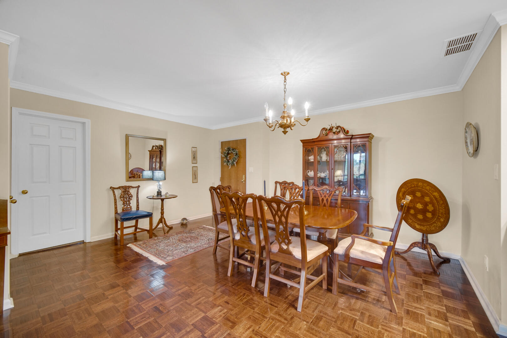 910 Ridge Road, Unit 405 Munster, IN 46321 - Photo 6 of 37 a view of a dining room with furniture and chandelier
