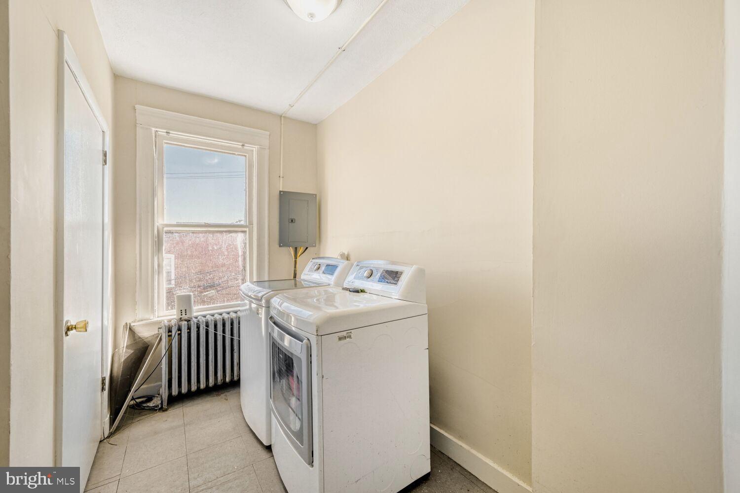3703 Belair Road Baltimore, MD 21213 - Photo 13 of 22 a utility room with dryer and washer