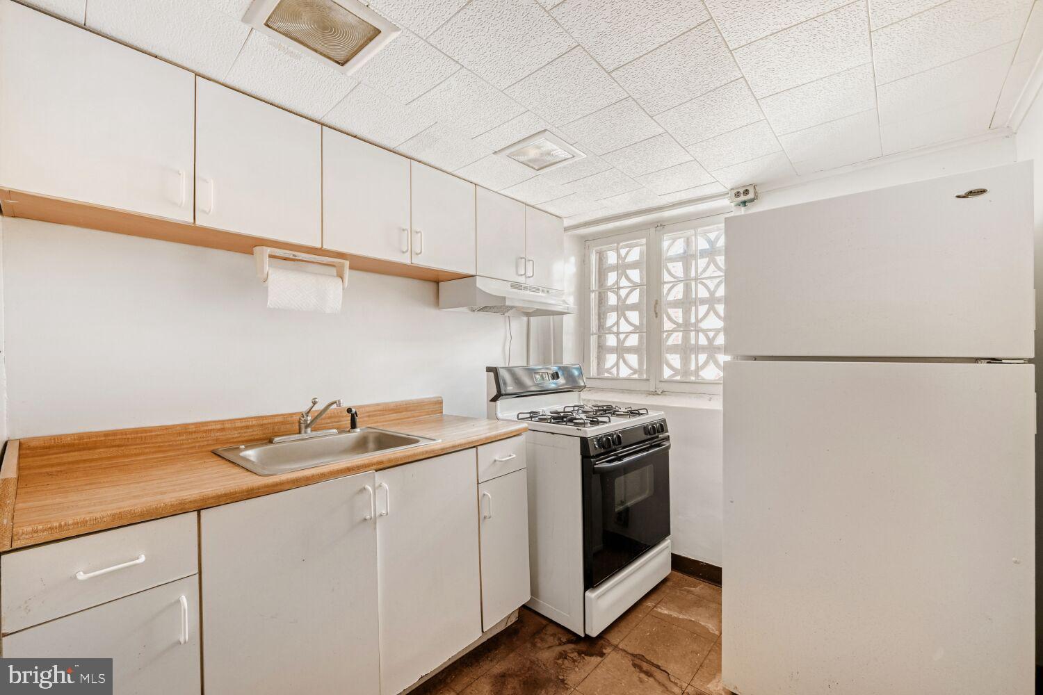 3703 Belair Road Baltimore, MD 21213 - Photo 17 of 22 a utility room with dryer and washer