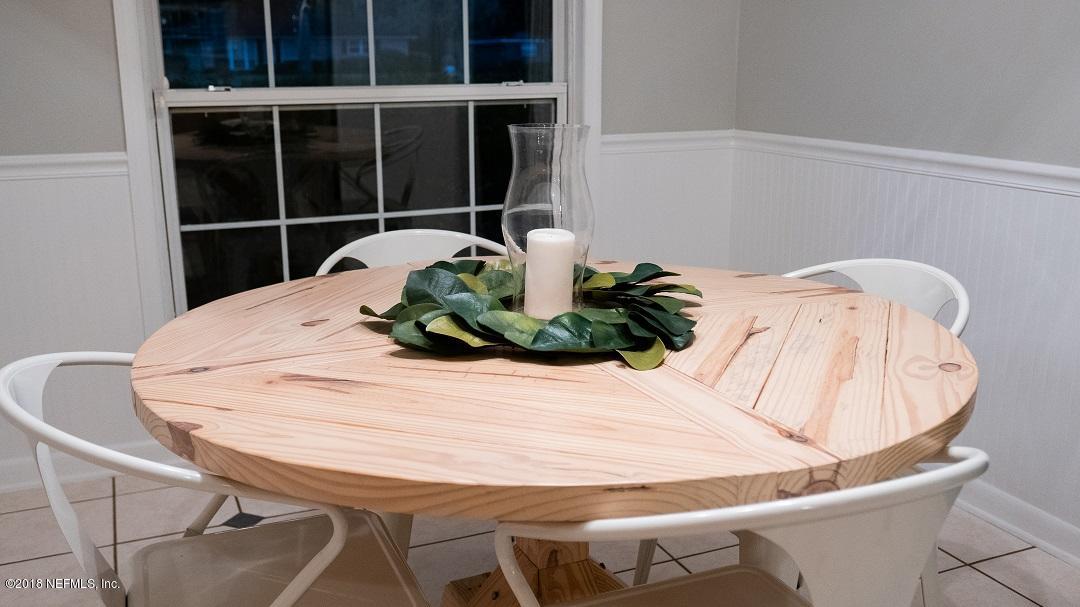 8918 San Rae Road Jacksonville, FL 32257 - Photo 21 of 33 a close view of dining table with chairs