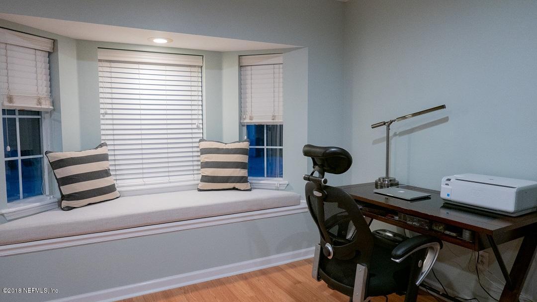 8918 San Rae Road Jacksonville, FL 32257 - Photo 23 of 33 a kitchen with a table chairs and a window