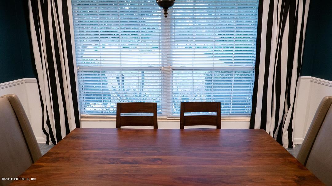 8918 San Rae Road Jacksonville, FL 32257 - Photo 33 of 33 a view of a livingroom with furniture and a window