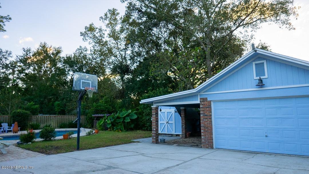 8918 San Rae Road Jacksonville, FL 32257 - Photo 9 of 33 a view of a house with a yard