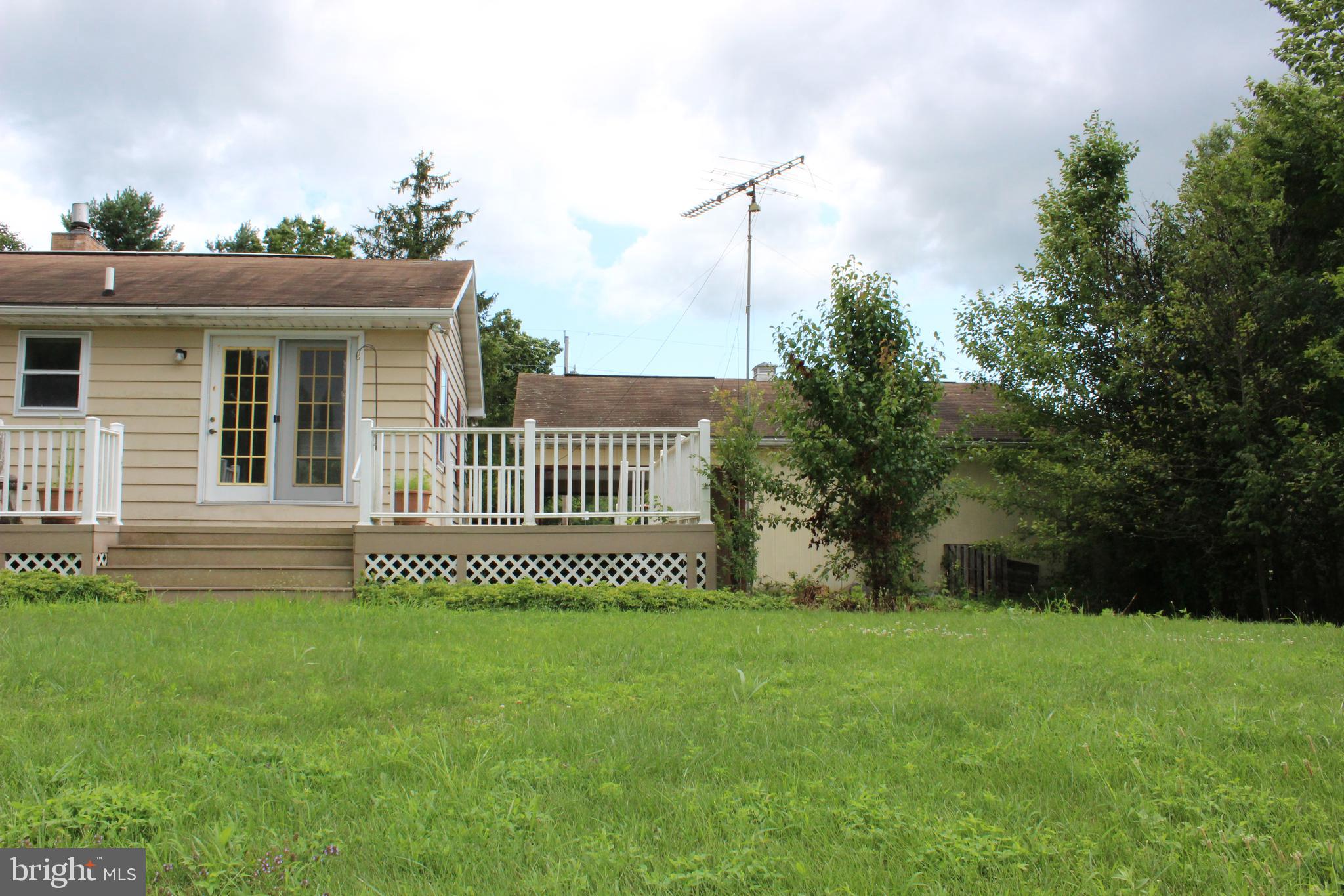801 Boyle Road Fairfield, PA 17320 - Photo 11 of 38 a front view of a house with a garden