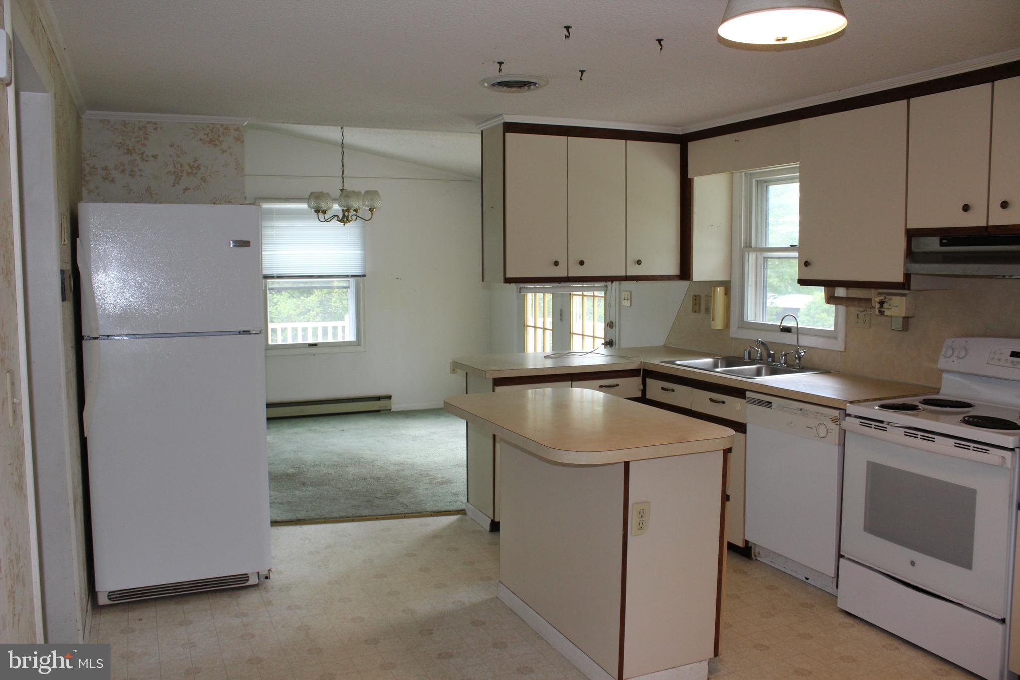 801 Boyle Road Fairfield, PA 17320 - Photo 21 of 38 a kitchen with a sink cabinets and window