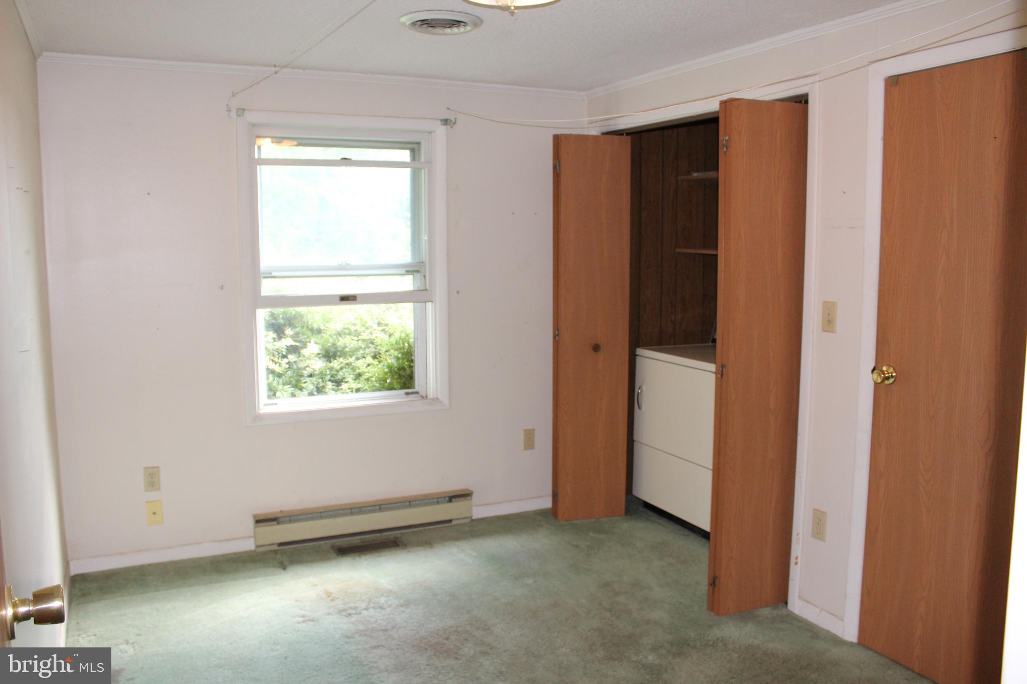 801 Boyle Road Fairfield, PA 17320 - Photo 24 of 38 an empty room with windows and closet